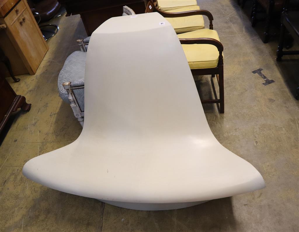 A 1960s white plastic chair